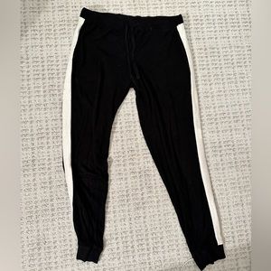 Top shop sweatpants, tie at waist, black with white stripe on the side, size 8